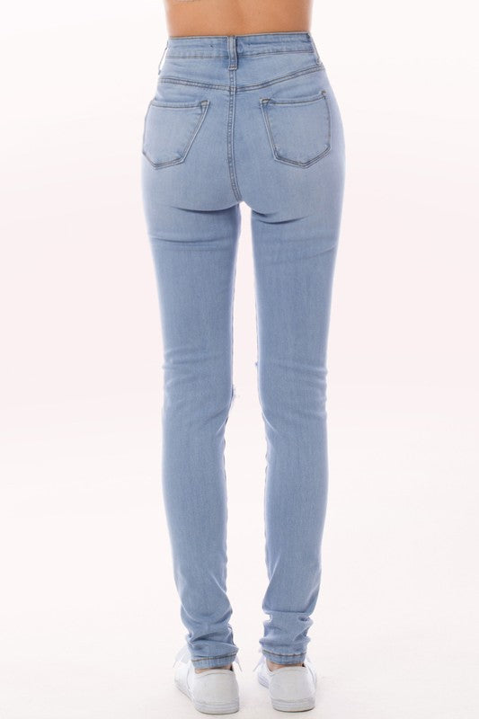 Ripped Knee Skinny Jeans